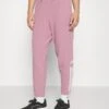 ADIDAS PERFORMANCE Tracksuit Bottoms - Orchid