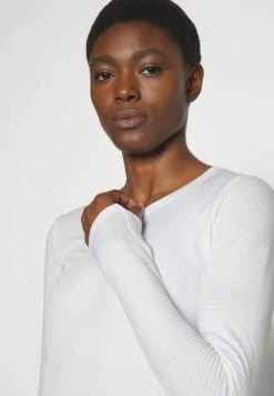 Athleta Flurry Blizzard Seamless - Long Sleeved Top - Bright White -Deals Sport Girl Outfit Store 3975c8b338ac4f3e869eaddc821ab210