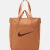 Nike Performance Gym Tote - Sports Bag - Amber Brown/Night Maroon -Deals Sport Girl Outfit Store 69d10098b0574916b51d396323a45a95