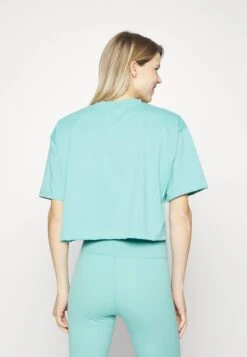 Ellesse Marcina - Sports T-Shirt - Blue -Deals Sport Girl Outfit Store b9aa41348e574420ac558e133a15b361