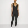 Guess Delma Jumpsuit - Gym Suit - Jet Black -Deals Sport Girl Outfit Store bf3a50e7bb984df7a835fae7a0287fbb