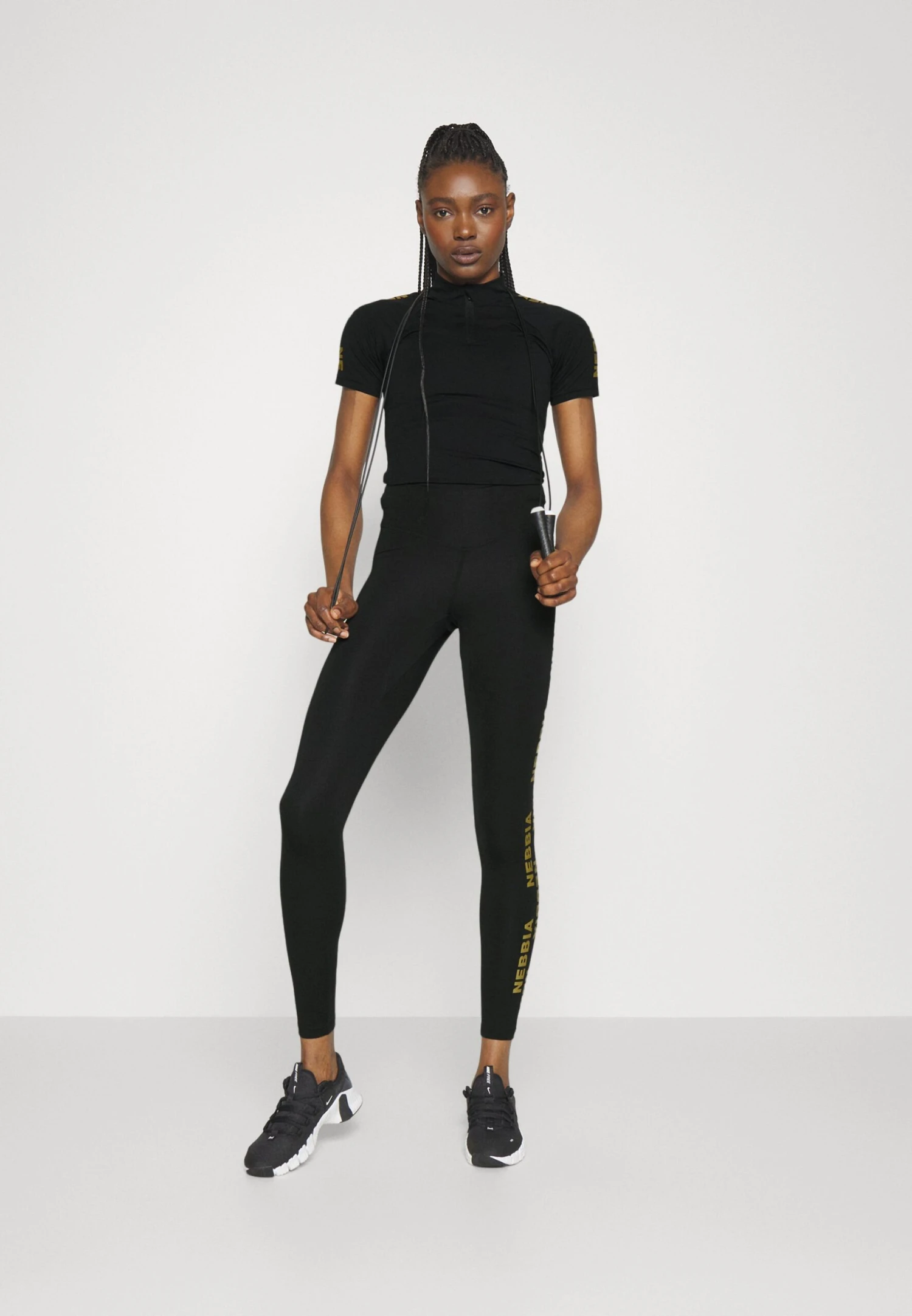 NEBBIA Women Compression Zipper Intense Ultimate - Polo Shirt - Black/Gold 4 NEBBIA Women Compression Zipper Intense Ultimate - Polo Shirt - Black/Gold - Image 2